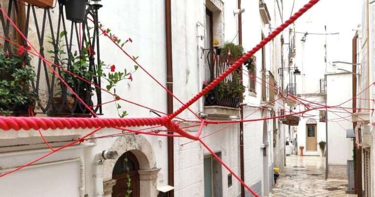gabriele mundula highlights the depopulation of rural italy with an set up of purple ropes