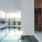 inside swimming pool by blockstudio emerges as a geometrical addition to residence in russia