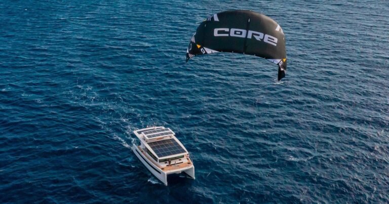 the SILENT 60 electric catamaran features a kite wing and 42 solar panels