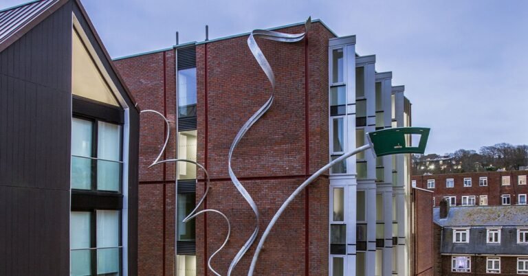 alex chinneck unveils 25-meter-high spiraling sculpture in brighton, uk