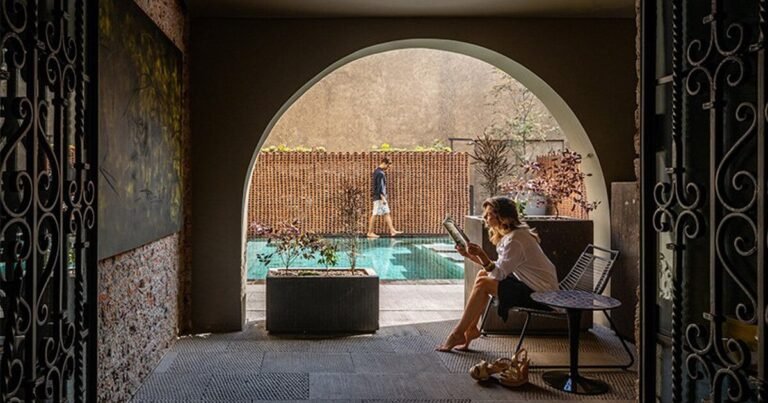 neocolonial 1900s mansion in mexico is reworked into distinctive lodge with artwork gallery