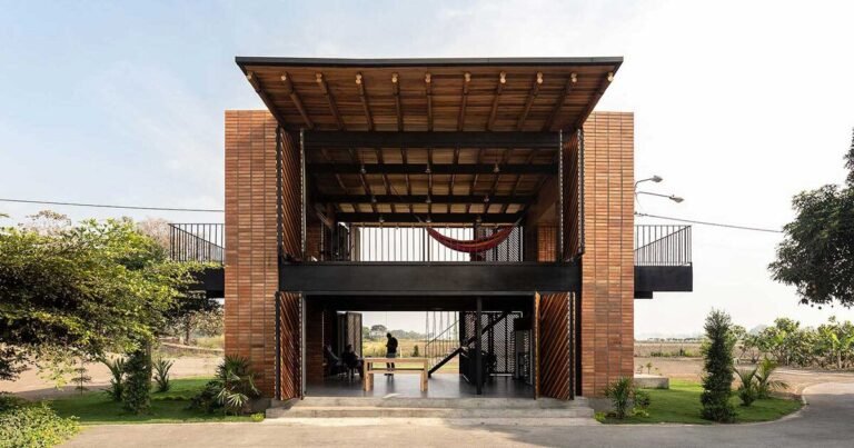 natura futura makes use of folding metallic panels to design a sports activities heart in rural ecuador