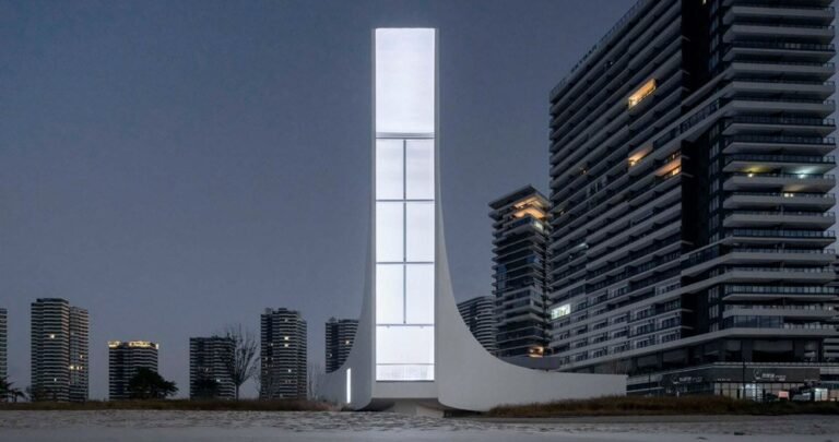 this chapel by o-office emerges as a floating pillar of sunshine over jinting bay