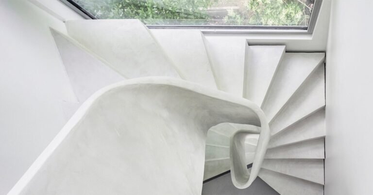 avignon architecte builds ‘twist’ home with sculptural ribbon staircase in nantes, france