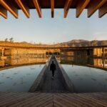 sordo madaleno arquitectos’ valle san nicolás clubhouse floats atop a lake in mexico