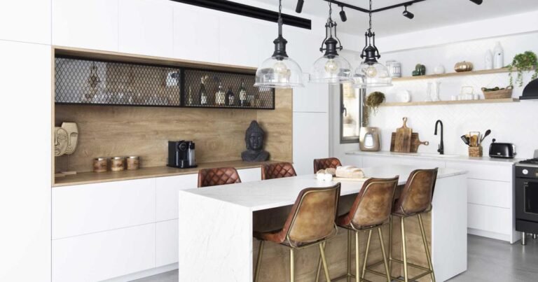 This Kitchen Island Was Designed To Also Be A Casual Dining Table With Seating On Both Sides