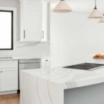 An S-Shaped Kitchen Island Flows Through This Remodeled Home