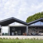 Pitched Roofs Cover This Dark And Moody Farmhouse