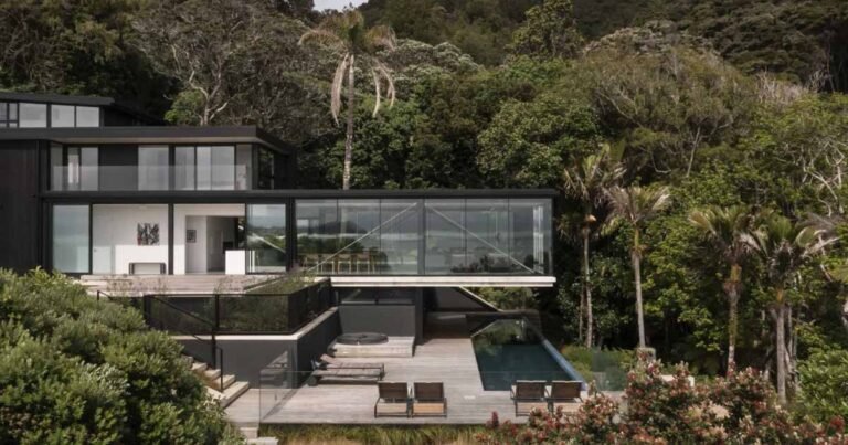 This Home Has A Living Room That Extends Over The Swimming Pool Below