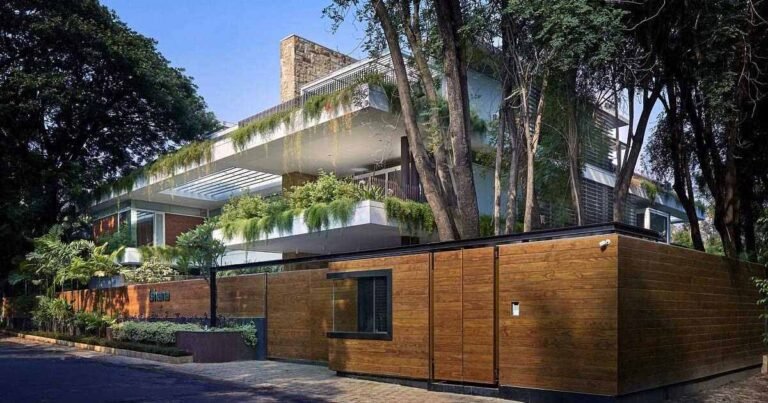 Overhanging Plants Surround The Exterior Of This Home