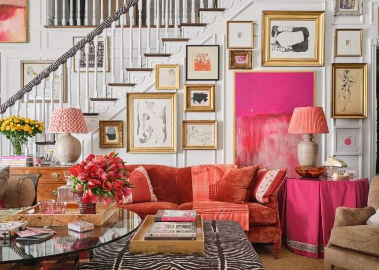 Bright pink appears in multiple places within this expressive living room by Lantz Collective.