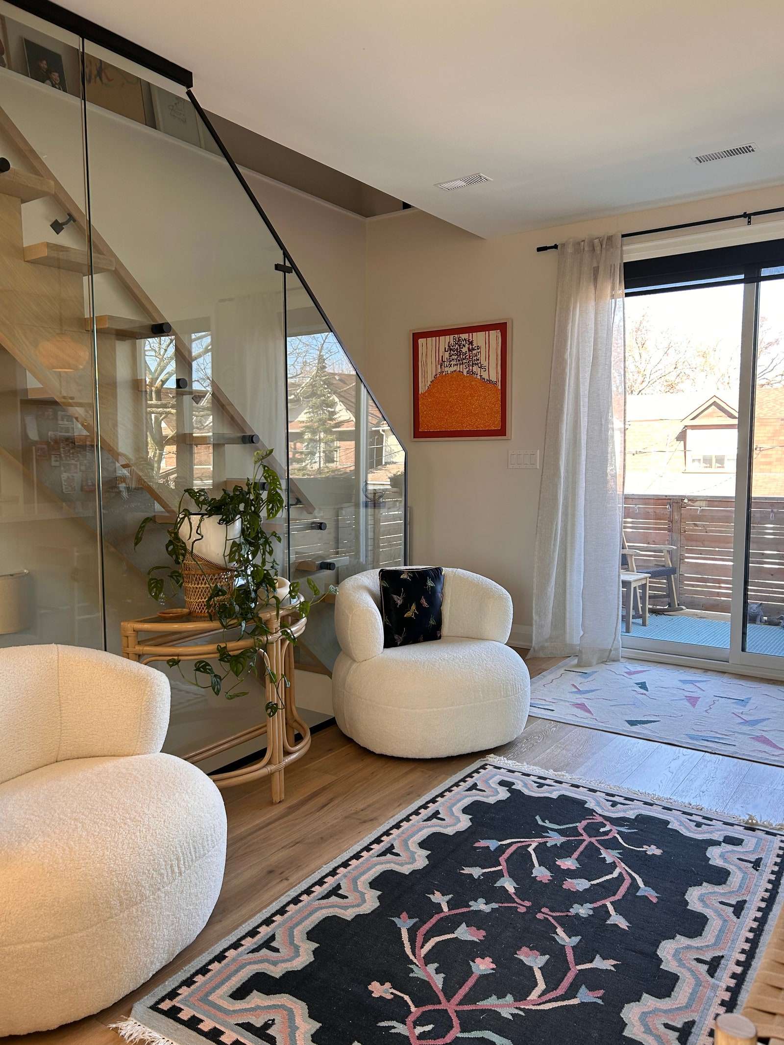 A glass wall staircase.