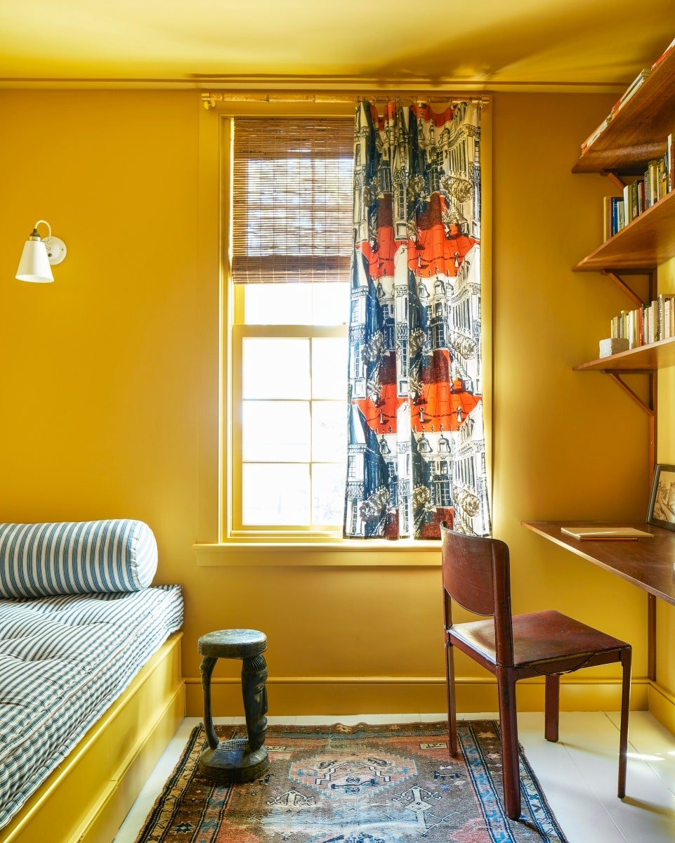 Image may contain Furniture Chair Shelf Living Room Room Indoors Rug Bedroom and Interior Design