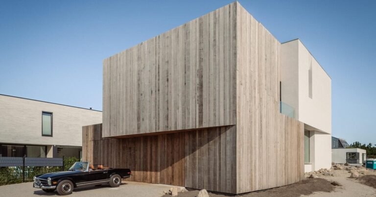 wooden cladding and lime plaster cover the solid form of villa k340 in the netherlands