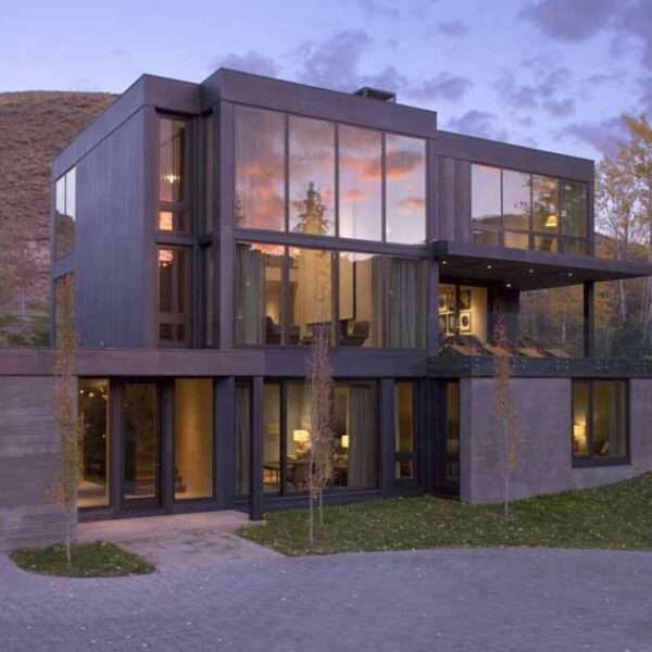 A Sheet Metal Skin Of Oiled Steel Was Selected For The Siding Of This Mountain Home