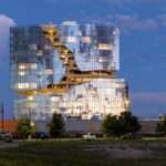 MAD Architects spilts open facade of One River North in Denver