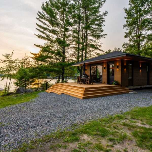 A small Canadian lakefront cabin with exposed Douglas Fir posts and beams.
