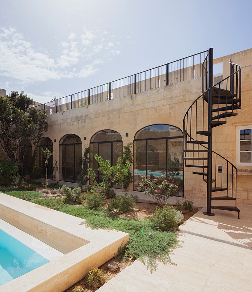 stone screen shields renovated 18th-century palazzino gardens in malta by AP valletta