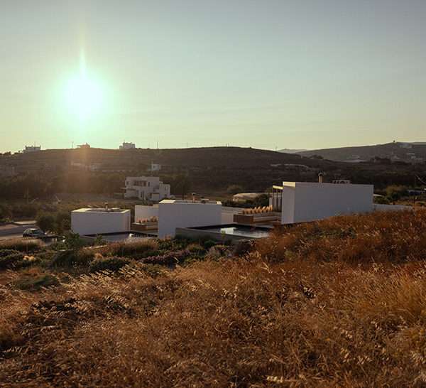 cubic volumes emerge from tinos’ rugged terrain in 'pnoes' hotel by aristides dallas architects