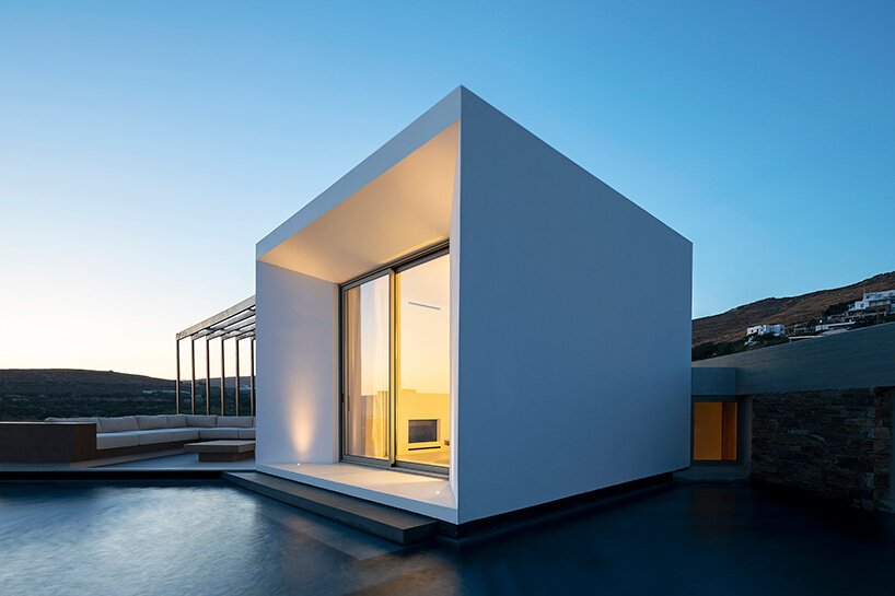 cubic volumes emerge from tinos’ rugged terrain in 'pnoes' hotel by aristides dallas architects
