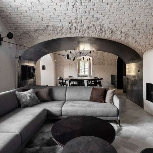 Architectural studio OOOOX, has shared photos of a guard house with a history dating back to the Middle Ages, that they've transformed into a multi-storey home.