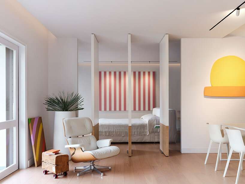 vibrant artworks by iacopo capone-doumas transform athens apartment into living gallery