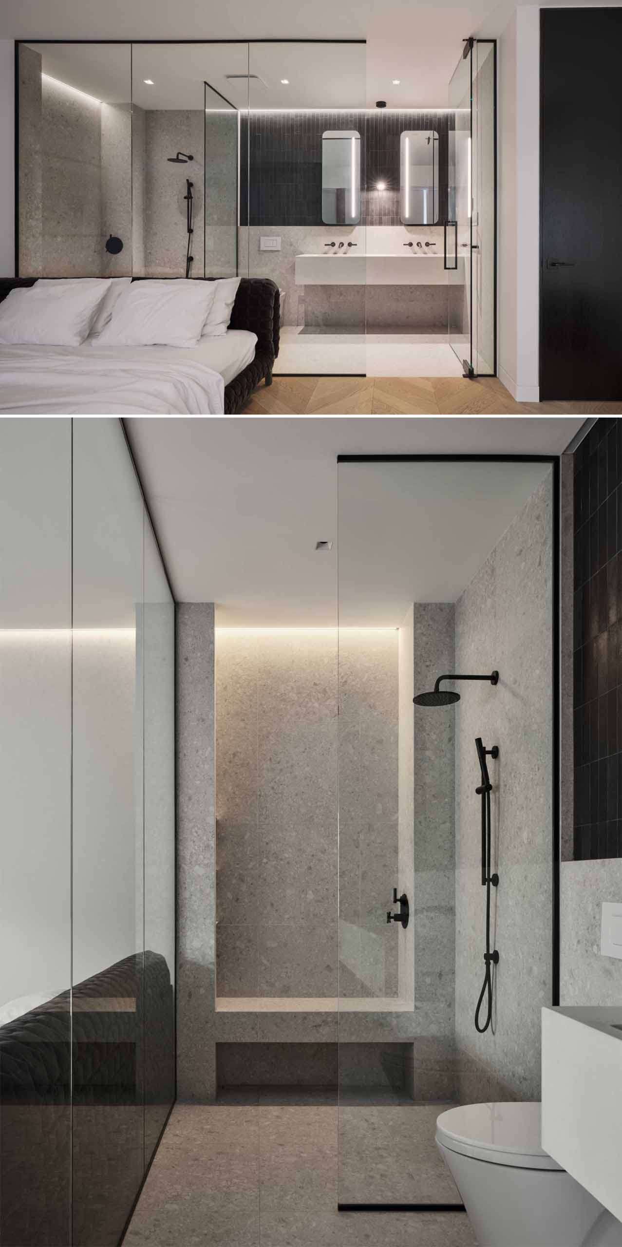 A modern bedroom that includes a glass-enclosed en-suite bathroom.