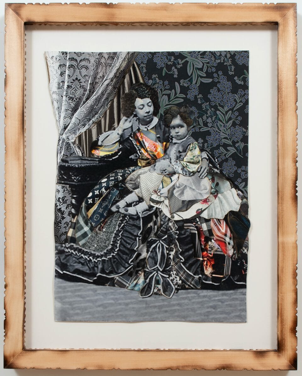 a collage of black and white photos and colorful textiles in a carved wooden frame. the photo depicts a mother and daughter