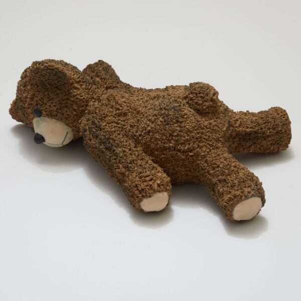 a ceramic sculpture of a teddy bear