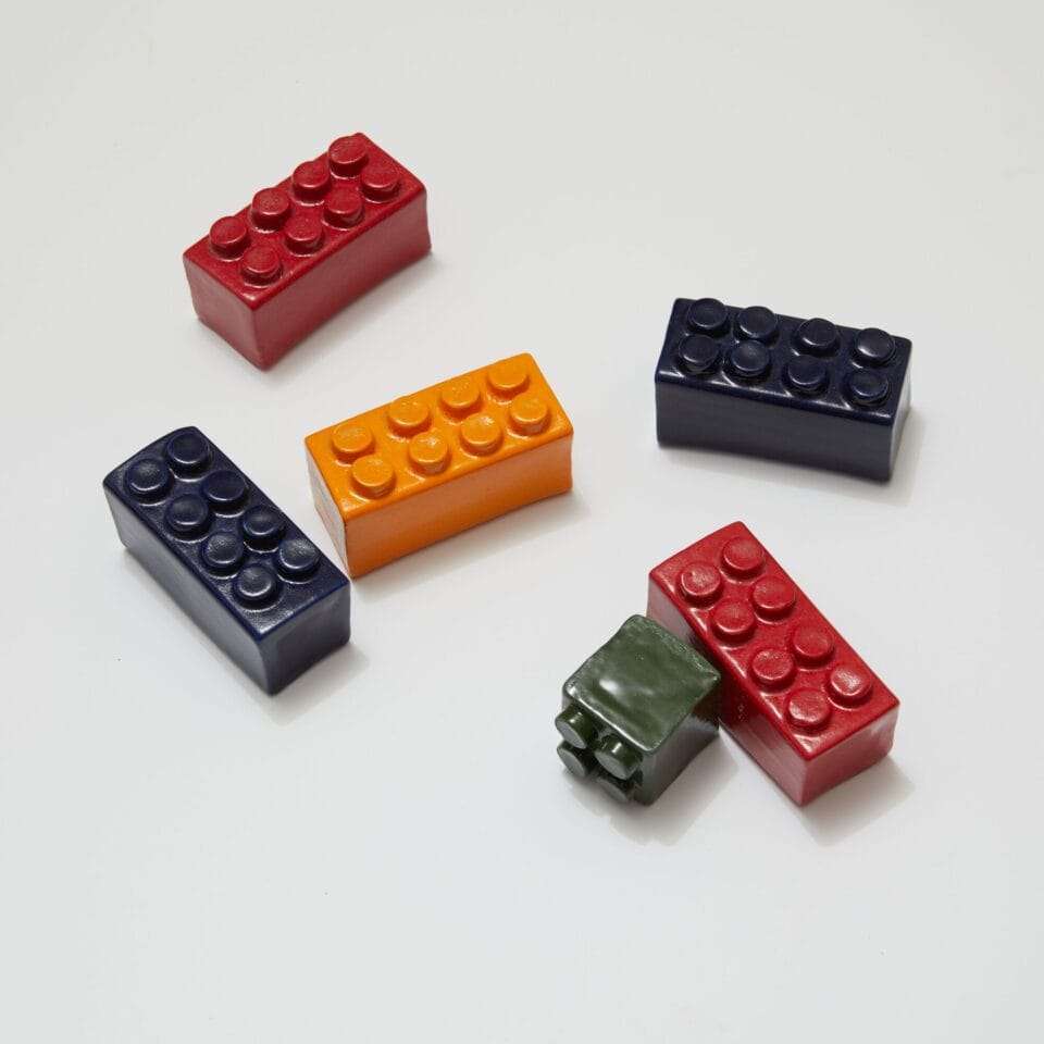 small ceramic sculptures of LEGO bricks