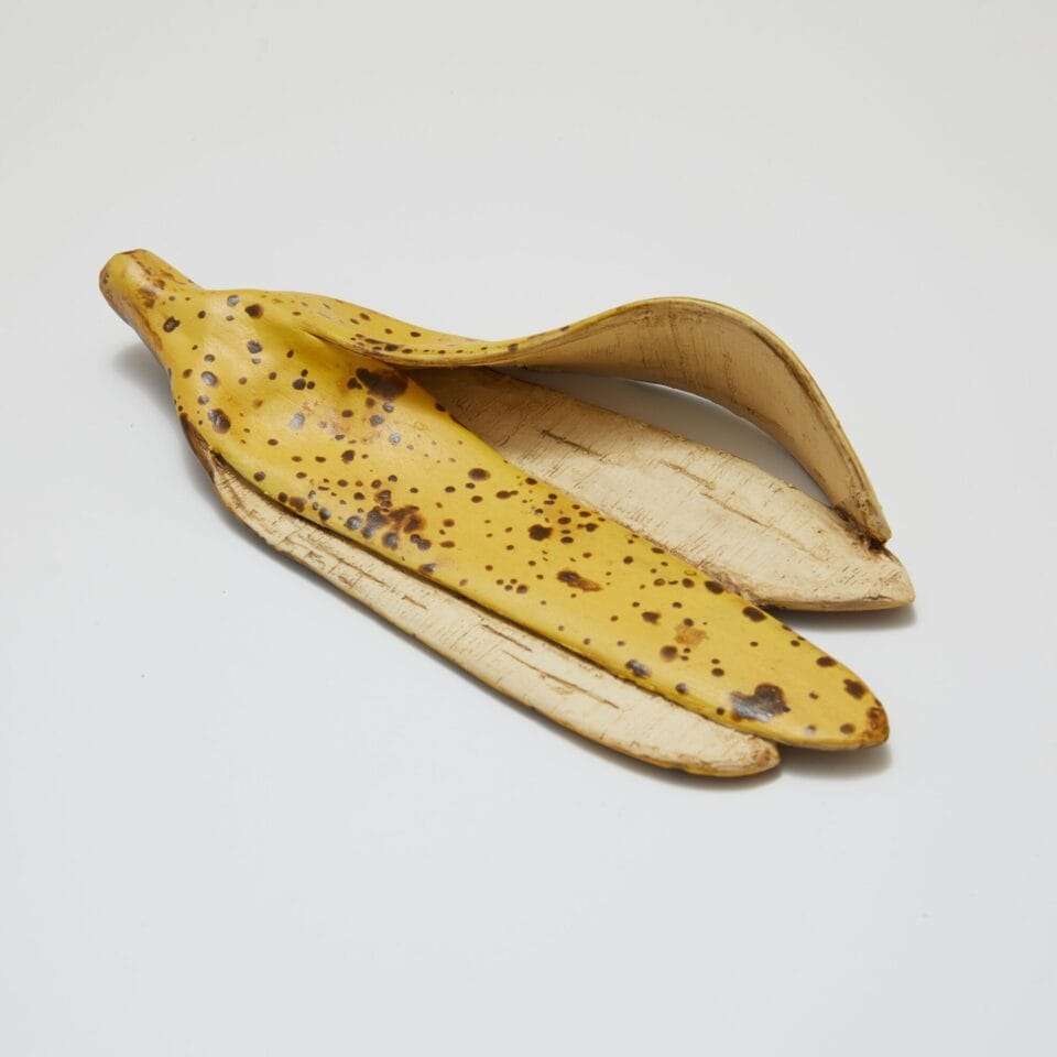 a ceramic sculpture of a banana peel