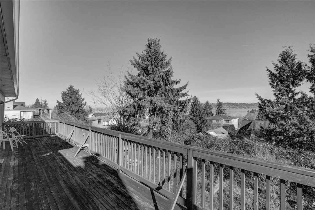 Before - a dated house and backyard.