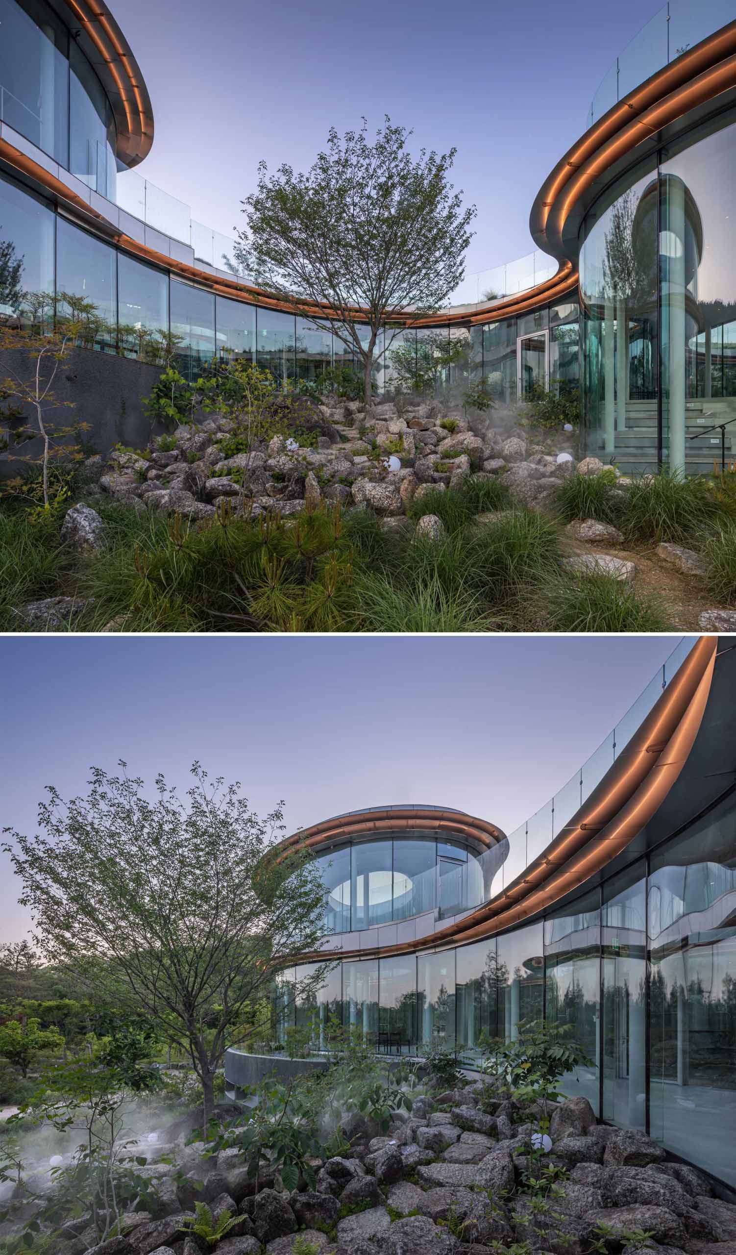 A modern cafe in South Korea, with social spaces and a green roof, was inspired by a walk in the forest.