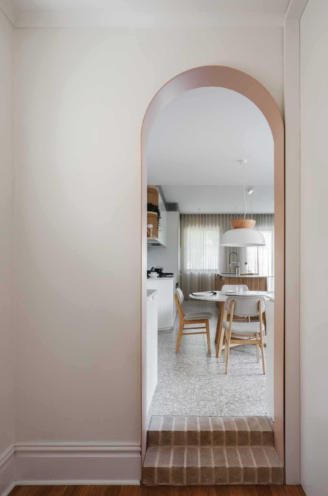 The threshold between new and old in the home is a arched steel doorway, leaving you in no doubt that you have just entered the heart of the home.
