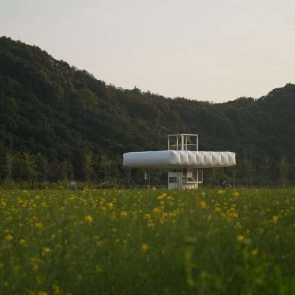 trio of inflated pavilions create rural café, cinema, and library amid rice fields in china