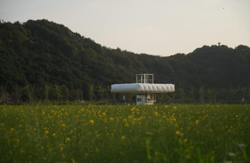 trio of inflated pavilions create rural café, cinema, and library amid rice fields in china