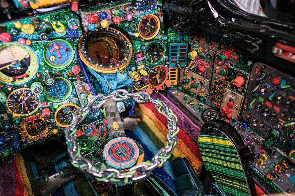 an elaborately beaded cockpit of a MiG-21 cockpit