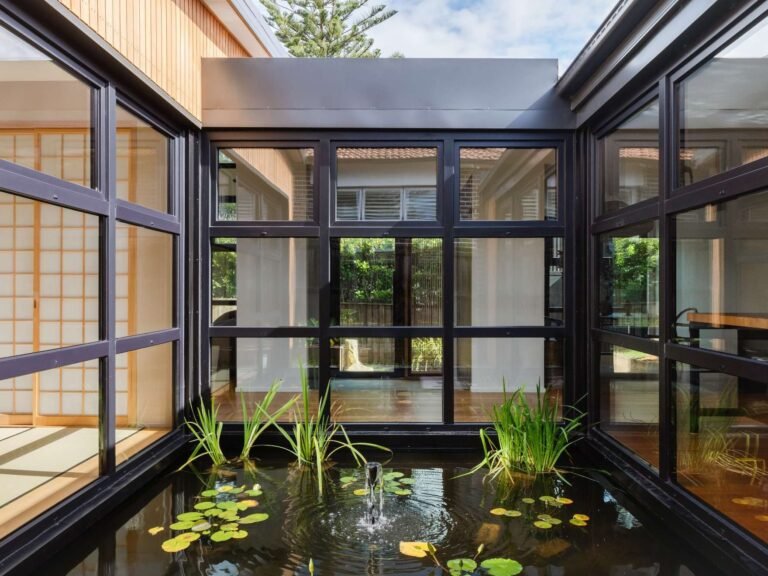 Step inside this Japanese-inspired home extension that's wrapped around a reflection pool