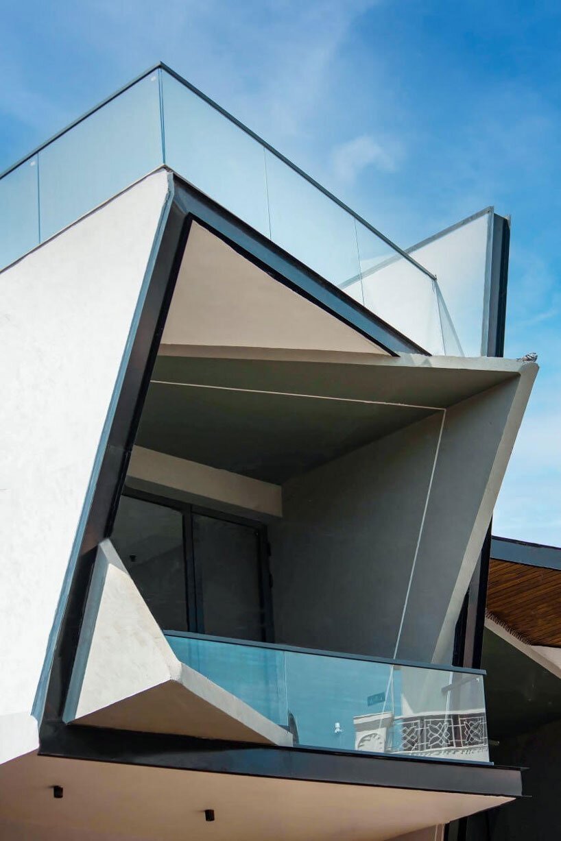 jagged planes in steel and concrete sculpt casa acentuada by smart arch studio in india
