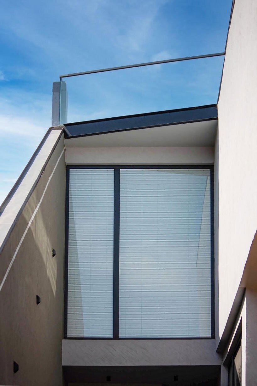 jagged planes in steel and concrete sculpt casa acentuada by smart arch studio in india