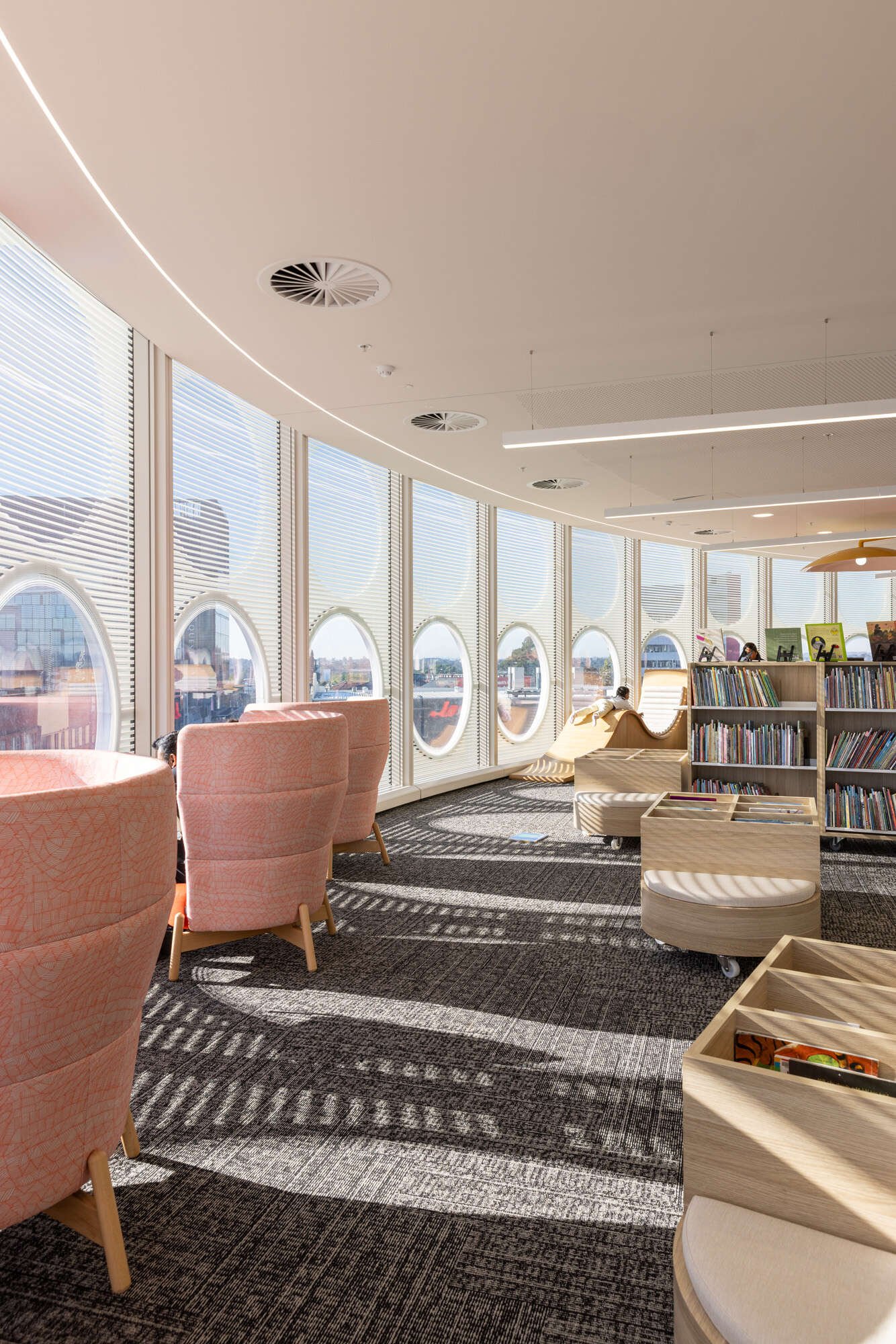 Youth areas have been designed to support group study and socialisation inside this library.