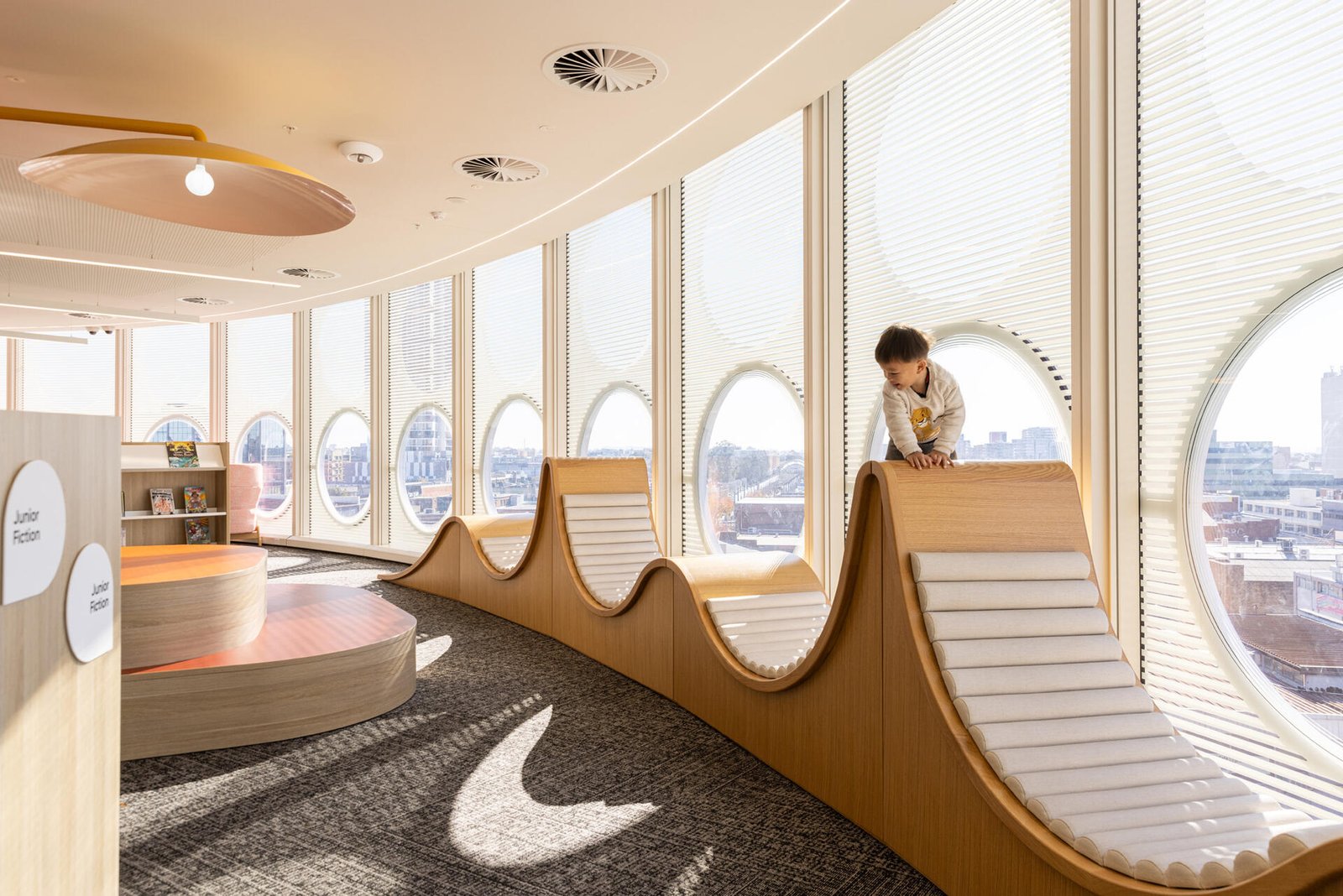 The outlook on the children’s level of this library is celebrated with special very popular ‘king of the castle’ tree-house lounges