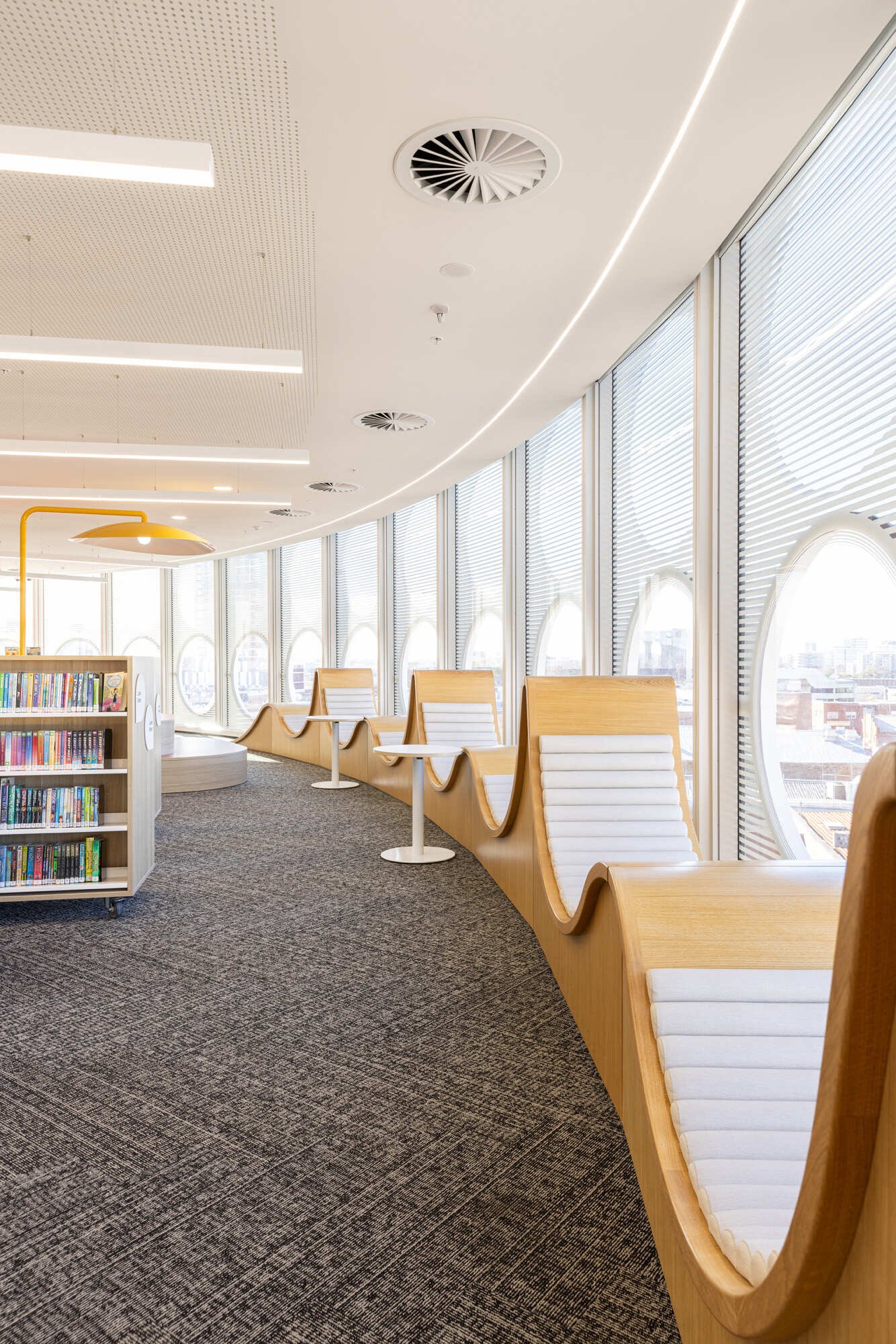 The outlook on the children’s level of this library is celebrated with special very popular ‘king of the castle’ tree-house lounges