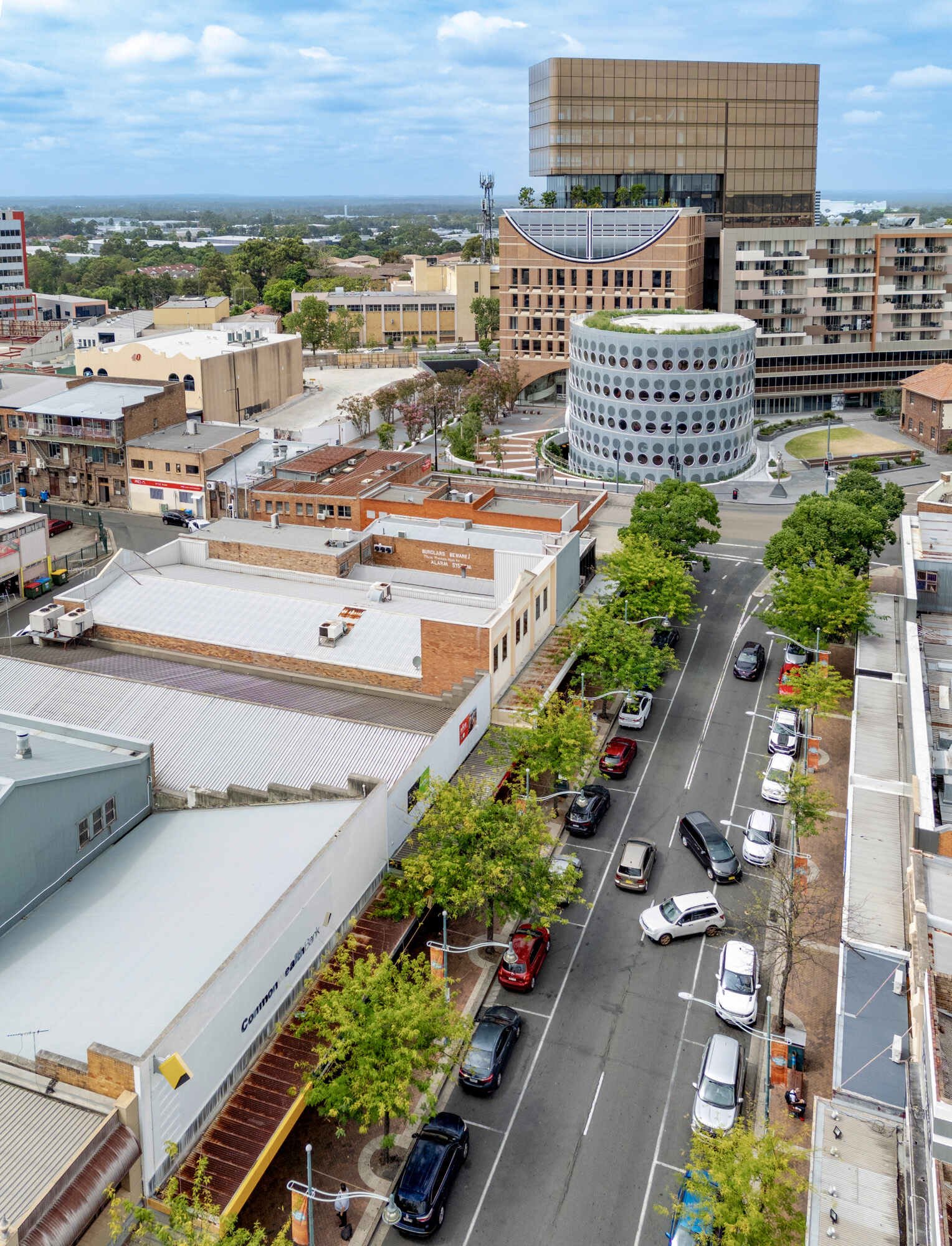 A modern library in Sydney, Australia, with round windows on its facade.