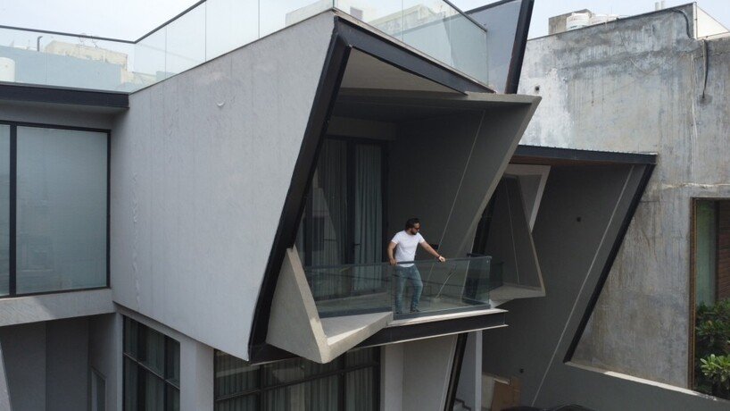 jagged planes in steel and concrete sculpt casa acentuada by smart arch studio in india