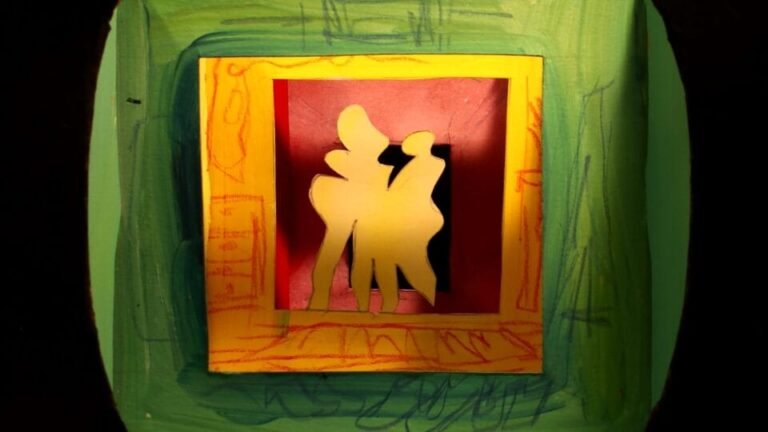 a layered assemblage of paper cut shapes, resembling two figures standing in a hallway