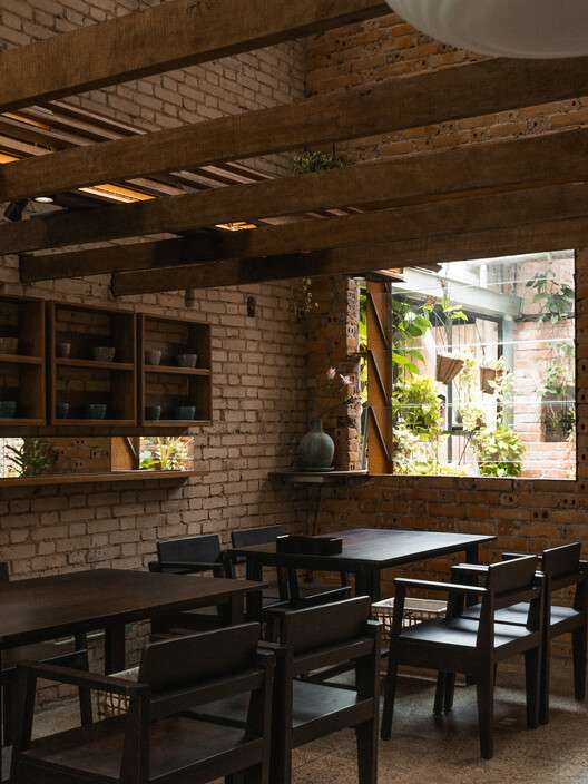 O Plant-based Ton That Dam Cafe Restaurant / xưởng xép - Exterior Photography, Wood, Lighting, Table, Chair, Brick