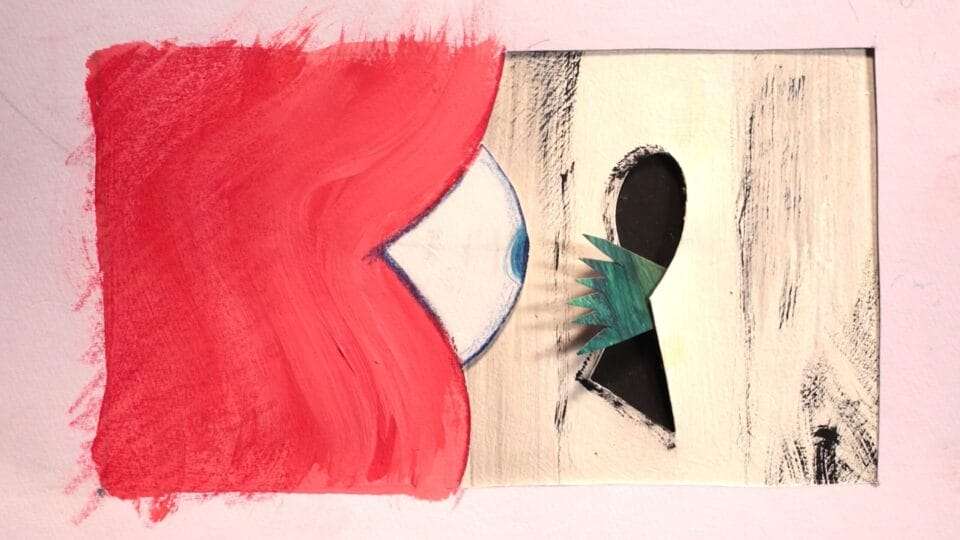 a red figure peers through a keyhole