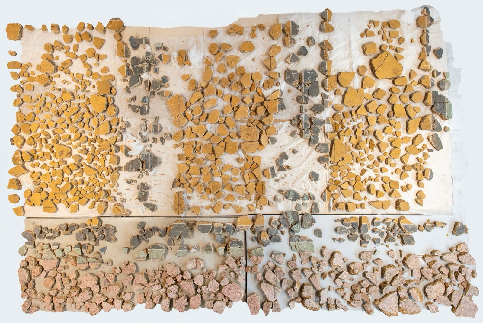 an overview of hundreds of pieces of an ancient Roman fresco