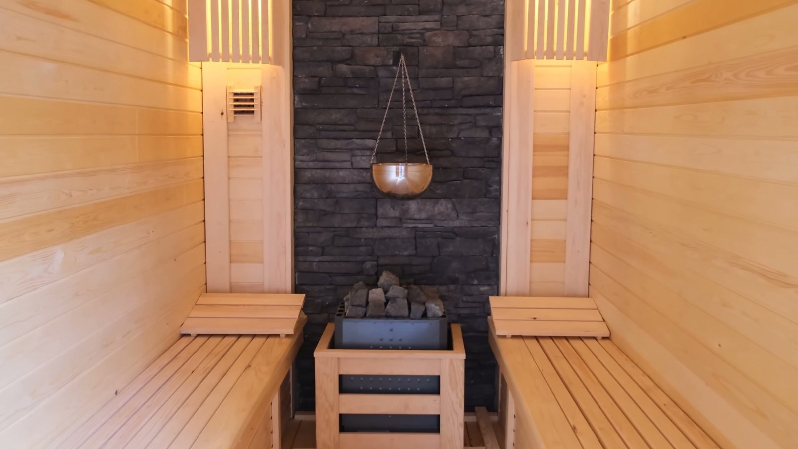 A wood-lined sauna in a Japanese-inspired home.